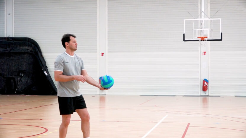 Man Prepares to Serve volleyball